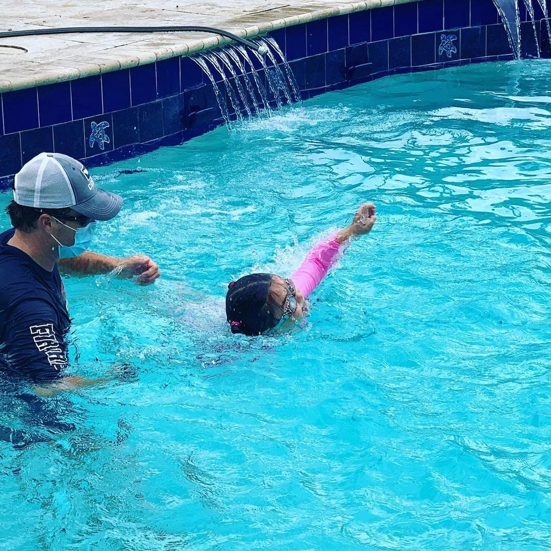 Swimming lesson at pool