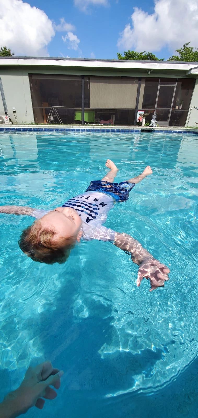Child learning to swim